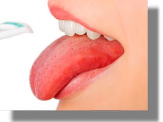 Έχετε λευκή γλώσσα; Μάθετε τα αίτια του παράξενου φαινομένου