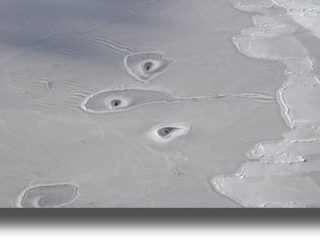 Μυστήριο στην Αρκτική: Η NASA ανακάλυψε «ανεξήγητες» τρύπες στον παγετώνα
